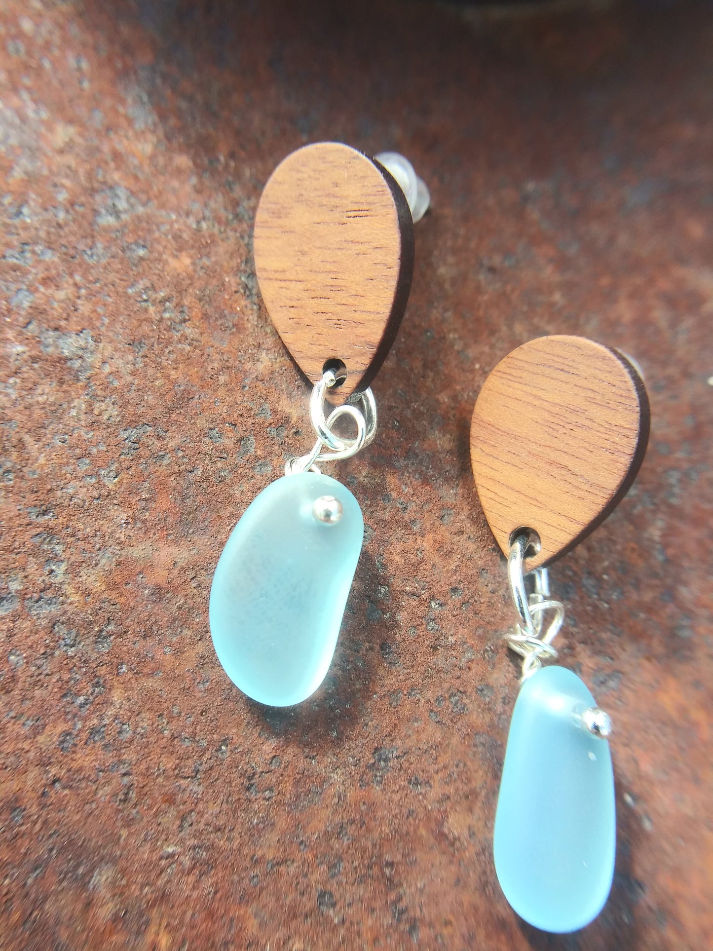 Pale Blue Sea Glass Earrings with stainless steel posts and wooden tear drop stud