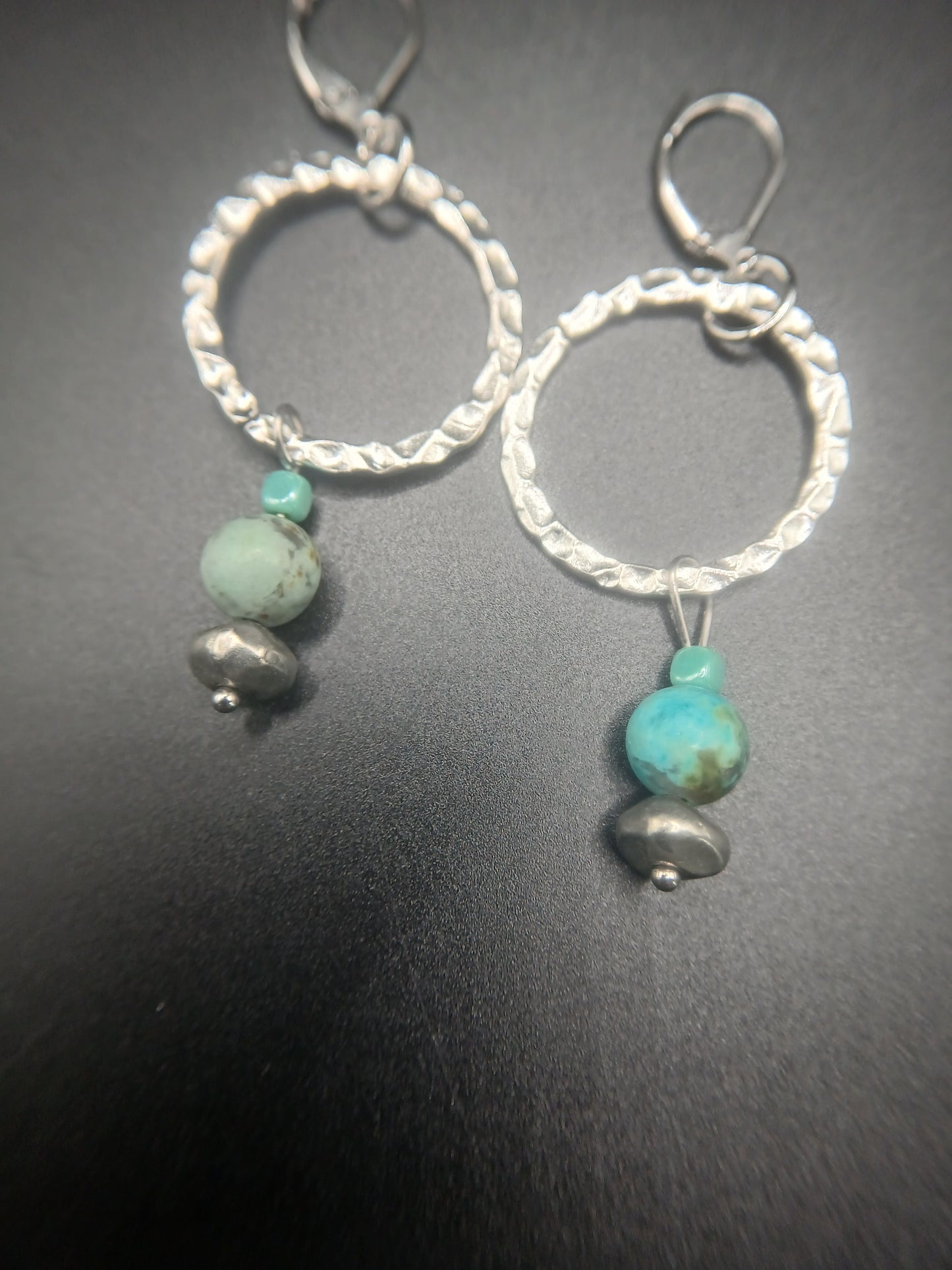Silver circles and turquoise