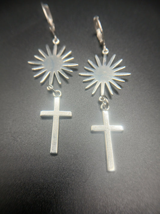 Silver sunburst and cross earrings