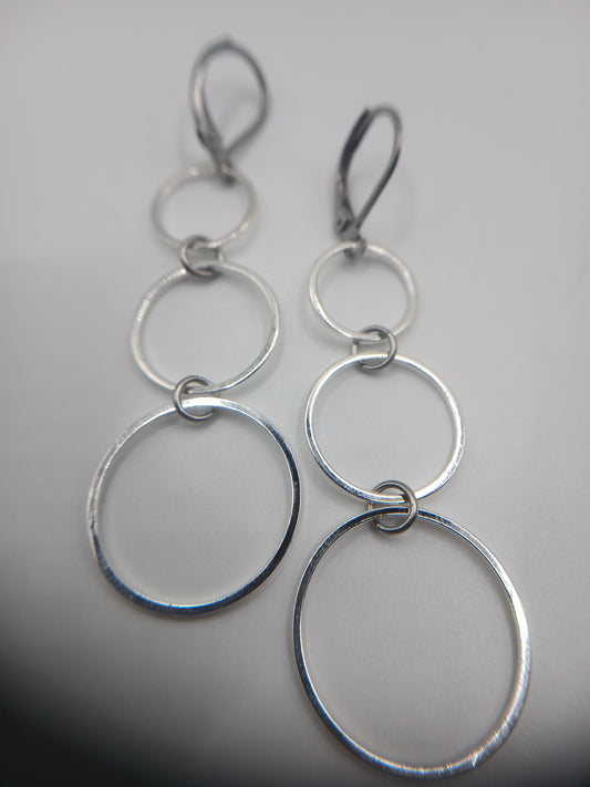 Three silver circles earrings