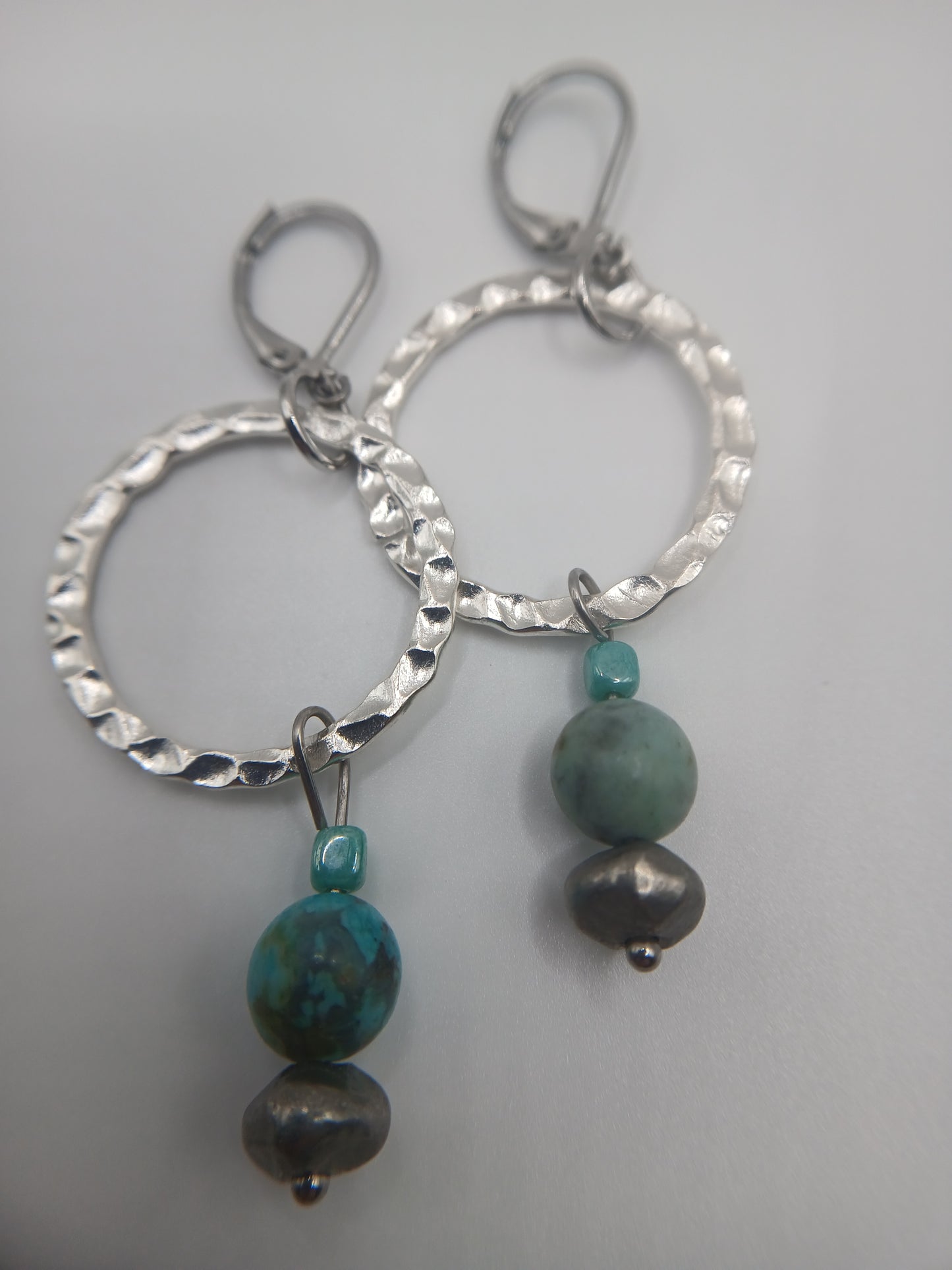 Silver hoops and turquoise earrings