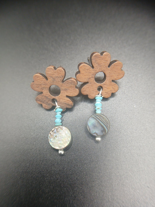 Wooden flowers with abalone posts